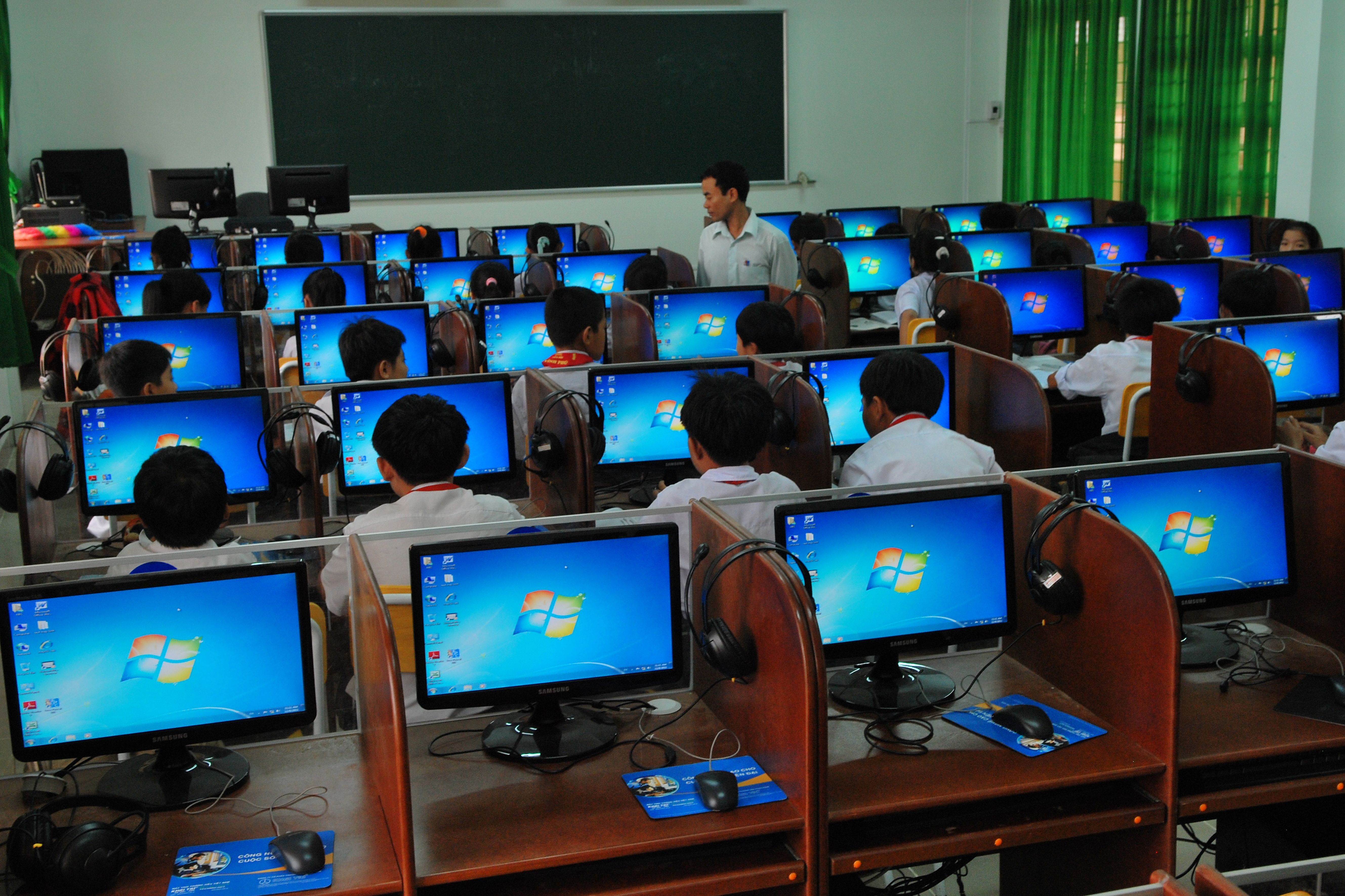 club members learning in a classroom
